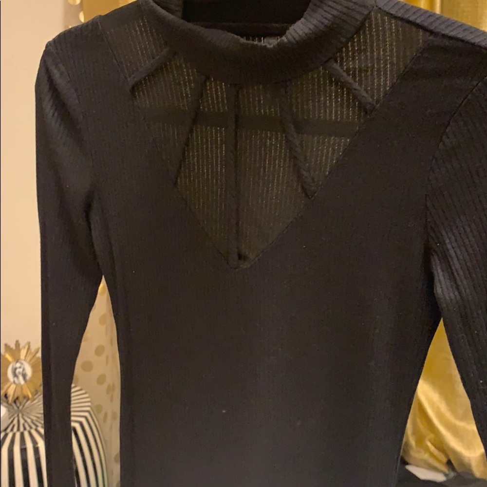 Tight black plunge top